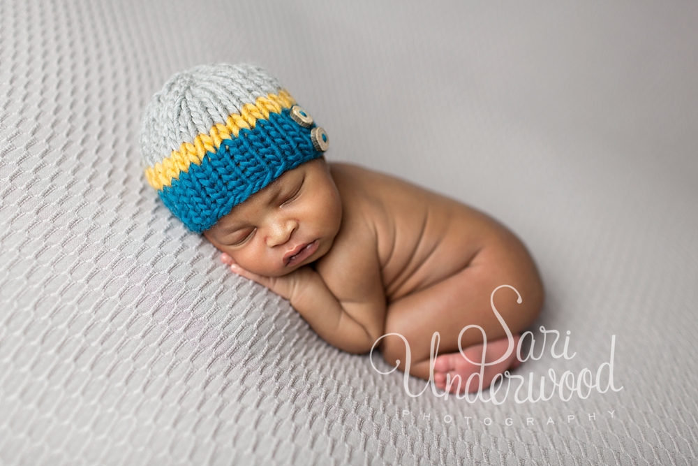 adorable baby boy wearing cute knit hat