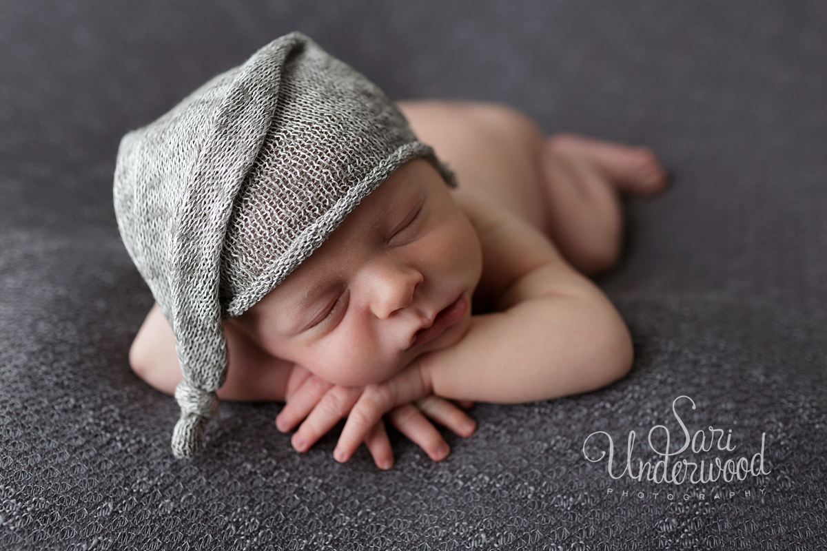 newborn baby boy in sleep cap
