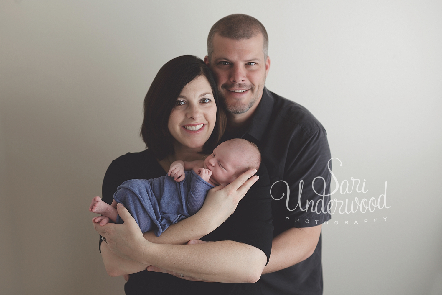 Parents with newborn baby boy