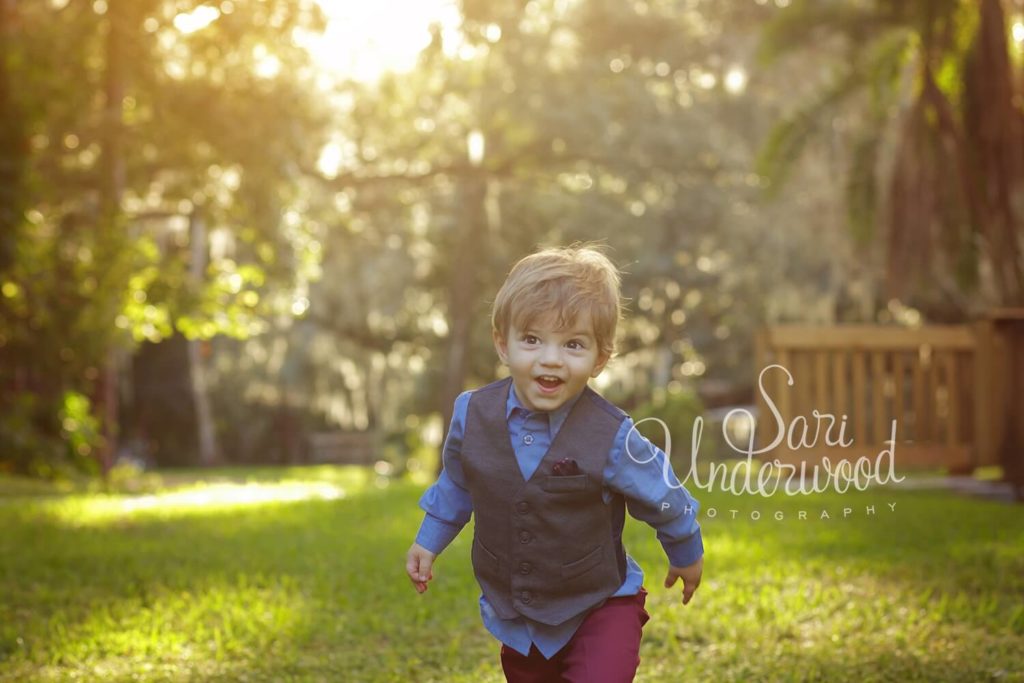 2yr old boy running outdoors