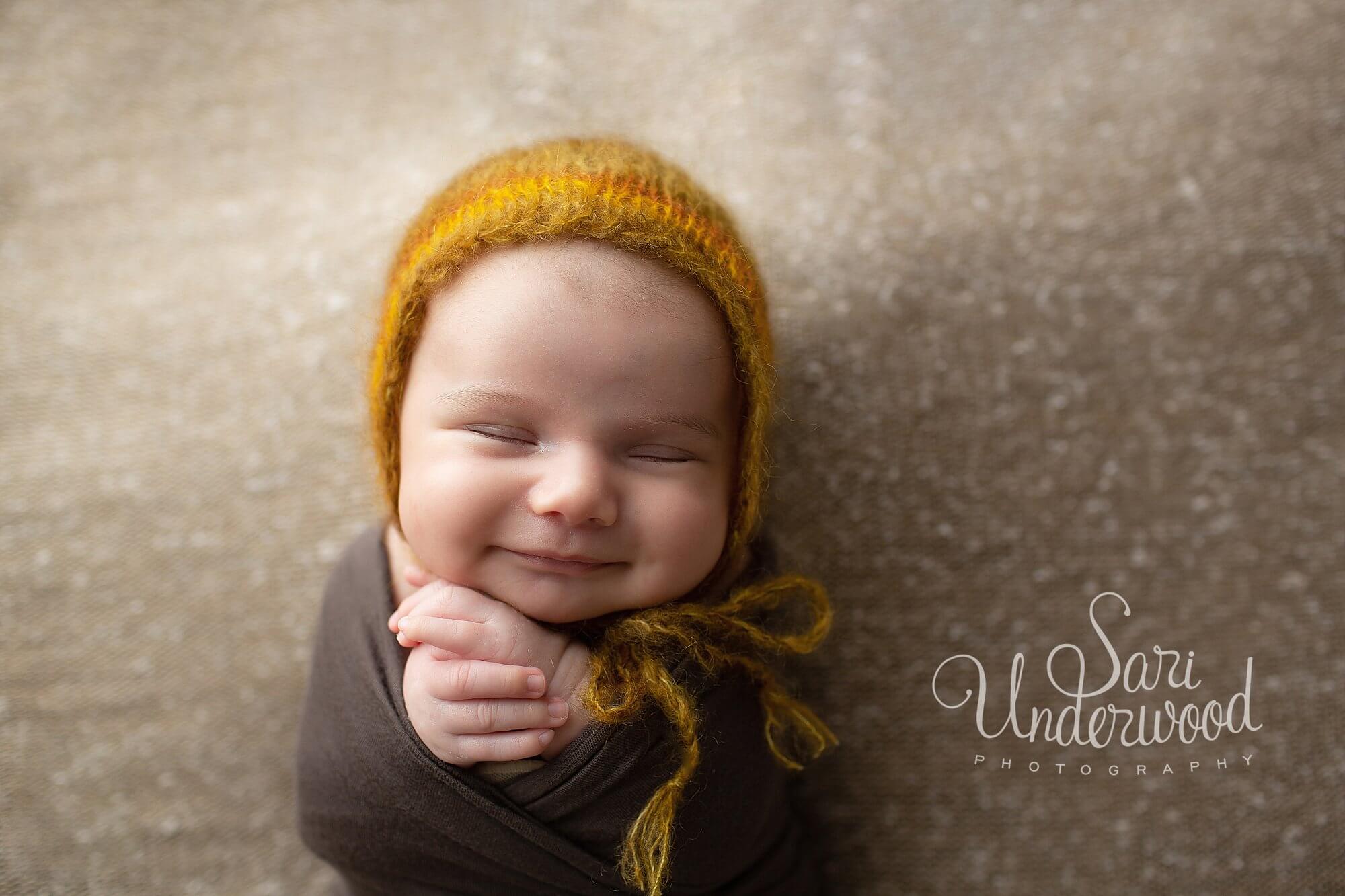 smiley newborn baby boy